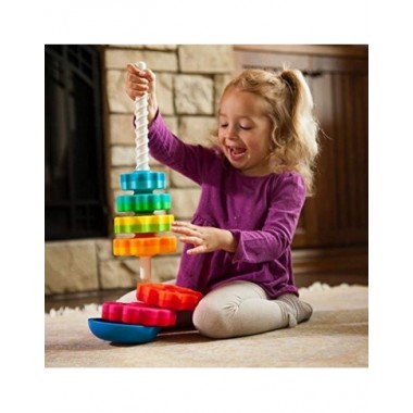 SpinAgain besisukantis bokštas ir besijuokianti mergaitė