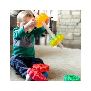 SpinAgain besisukantis bokštas ir kūdikis ardantis žiedų bokštą