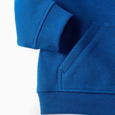 ZIPPY mėlynas džemperis Monstriukas (6/9-24/36 mėn) iš arti, matosi rankogaliai ir kišenė