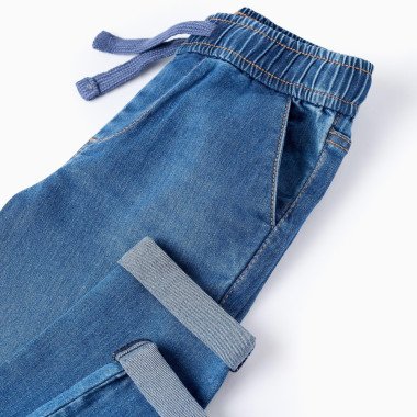 ZIPPY mėlyni džinsai berniukams (3/4-13/14 m) iš arti, matosi juosmuo su raišteliais