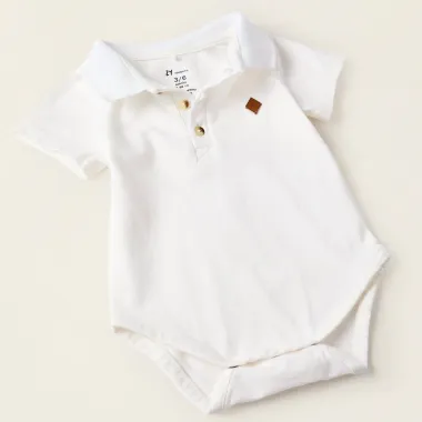 ZIPPY džinsinis kostiumėlis kūdikiams (0/1-9/12 mėn), baltas bodžiukas iš arti