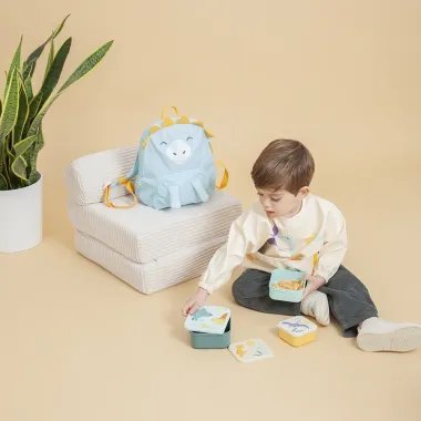 Miniland užkandžių dėžutės vaikams Dinozaurai ir šalia sėdintis vaikas