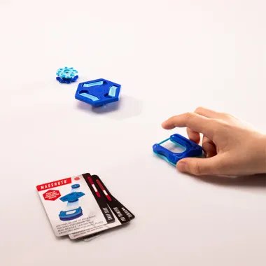 „Magshuto“ magnetinių kapsulių paleidimo įrenginys ir taikinys