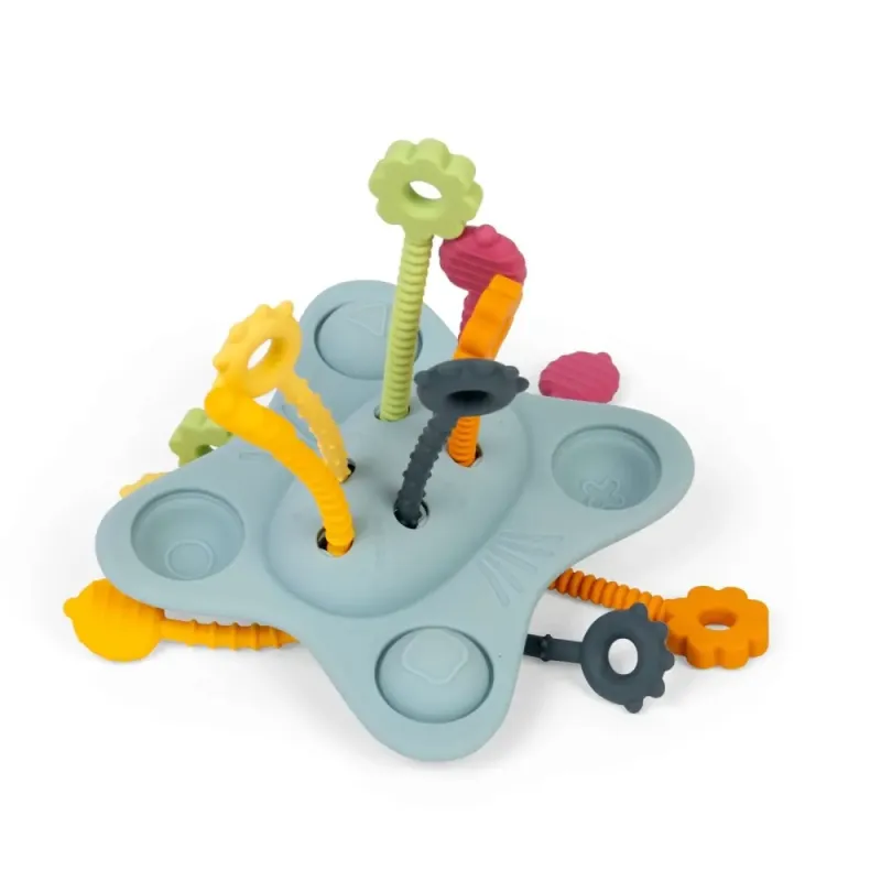 Sensorinis silikoninis žaislas „Pull, Push & Pop“ su spalvotomis virvelėmis. Sensorinis silikoninis žaislas „Pull, Push & Pop“ su spalvotomis virvelėmis.