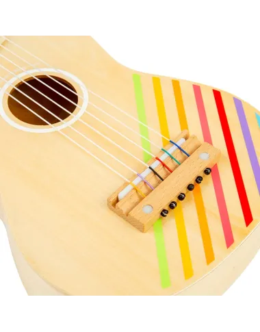 Medinė gitara vaikams su vaivorykštės juostomis. Medinė gitara vaikams su vaivorykštės juostomis.