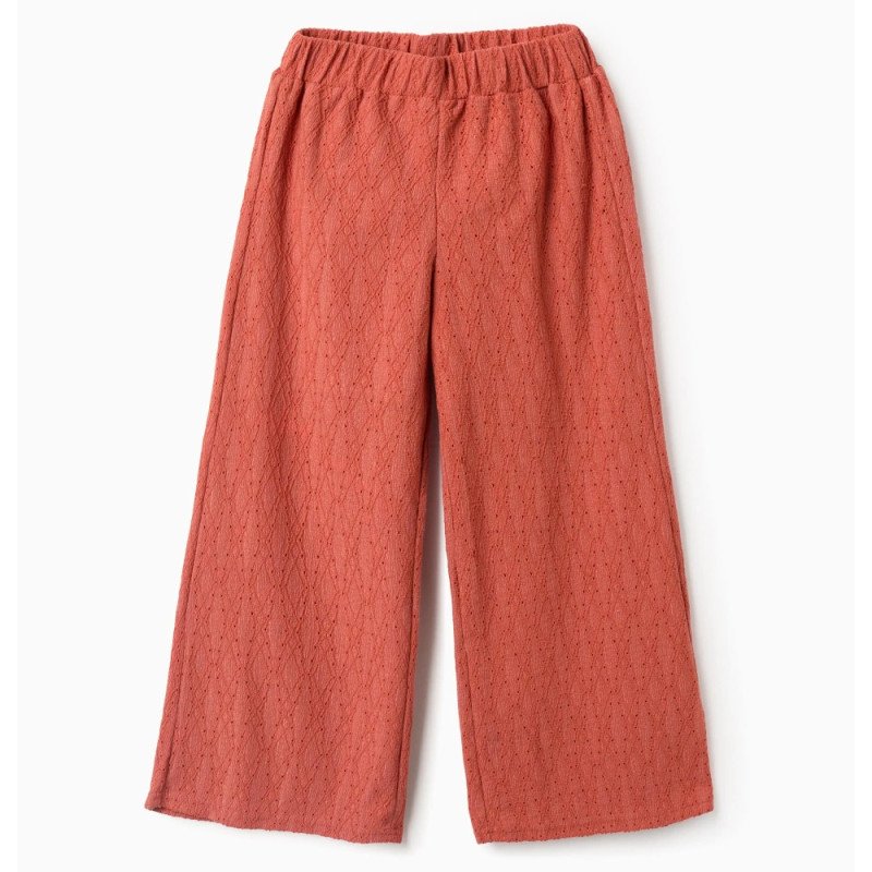 Oranžinės plačios kelnės mergaitei