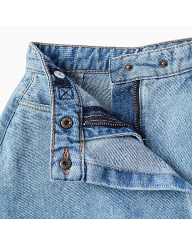 Šviesiai mėlyni džinsiniai šortai-sijonas mergaitei Šviesiai mėlyni džinsiniai šortai-sijonas mergaitei