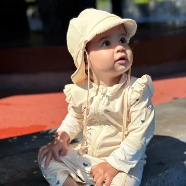Krēmīgs peldcepure ar UPF 50+ saules aizsardzību (0-2 gadi) | Lapute.lt