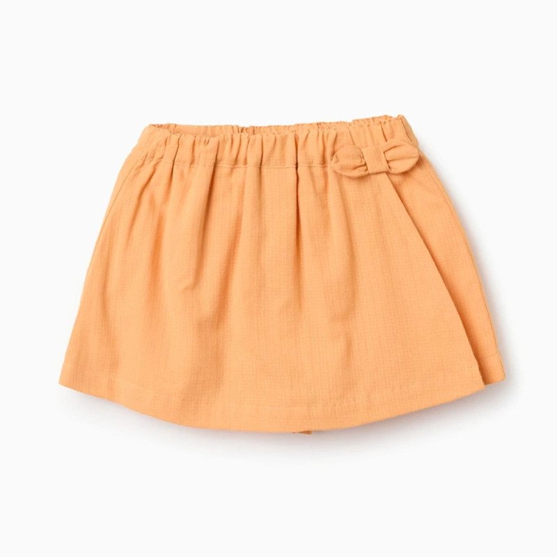 Oranži šorti–svārki (6/9–24/36 mēn.)